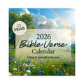 The 2026 Religious Wall Calendar by HannahFaithstore features a wildflower meadow, trees, blue sky, and rainbow on its cover. This faith-based gift offers a 12-month duration with nourishing Bible verses for inspiration.