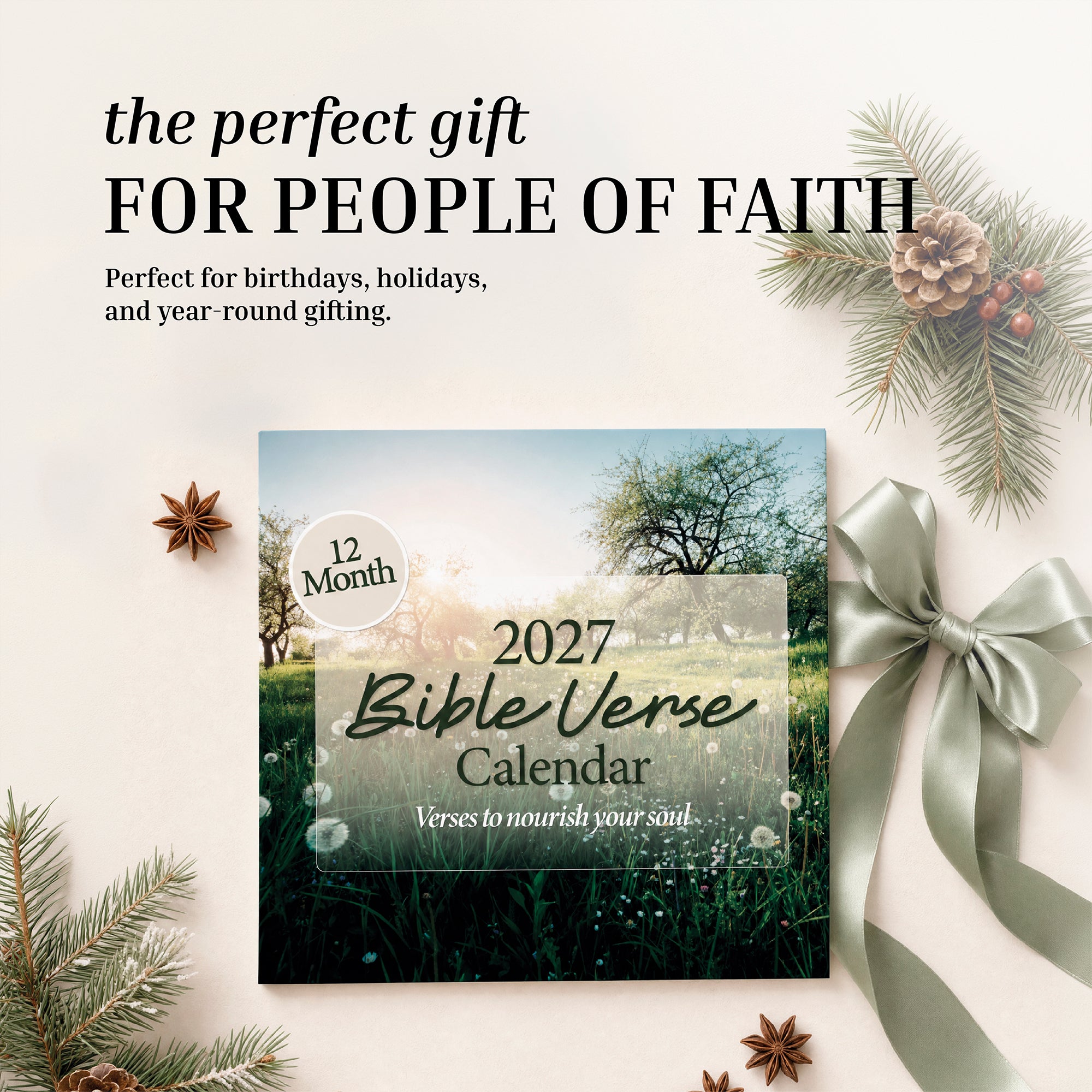 The 2027 Religious Wall Calendar by HannahFaithstore is displayed on a white surface adorned with pine sprigs, pinecones, ribbon, and star anise. Featuring inspiring Bible verses each month, this calendar is described as a thoughtful faith-based gift for people of faith. It’s perfect for encouraging loved ones throughout the year and pairs beautifully with a 2026 wall calendar for ongoing inspiration.