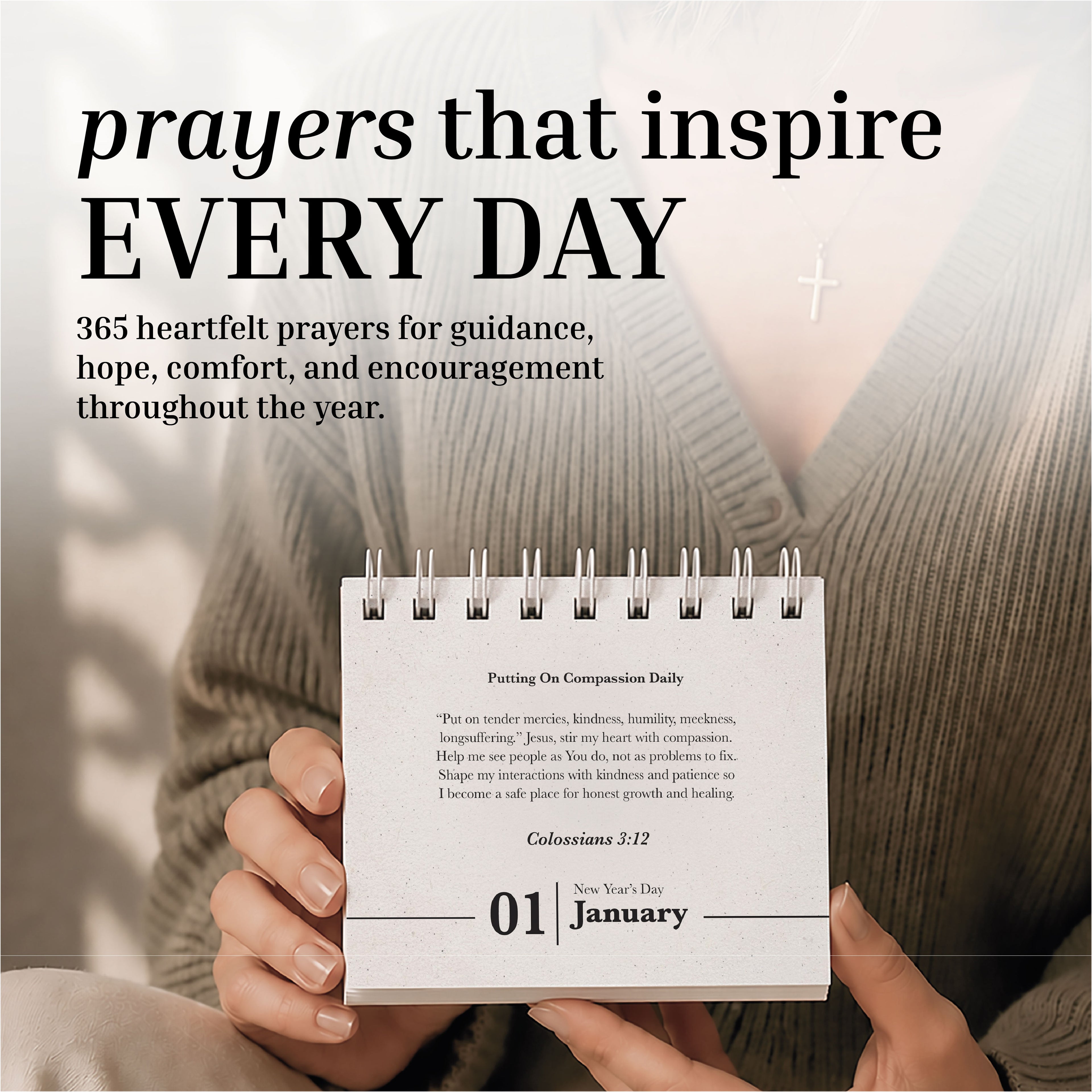 A person holds a cross necklace and has the HannahFaithstore Perpetual Prayer A Day Calendar open to January 1, featuring prayers for guidance, hope, and encouragement.