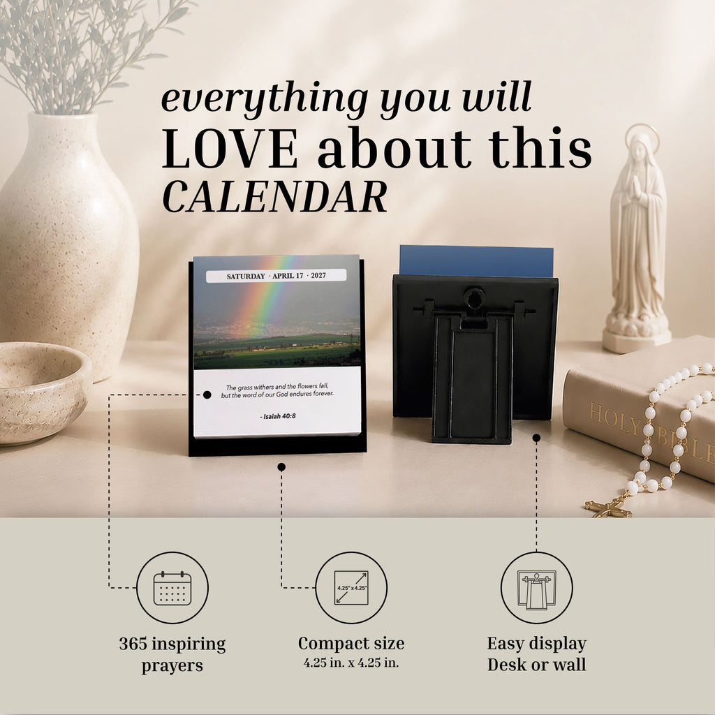 The 2027 A Verse A Day Calendar by HannahFaithstore is shown on a table with a vase, book, and rosary. This compact calendar offers 365 prayers for daily inspiration and can be conveniently displayed on your desk or wall.